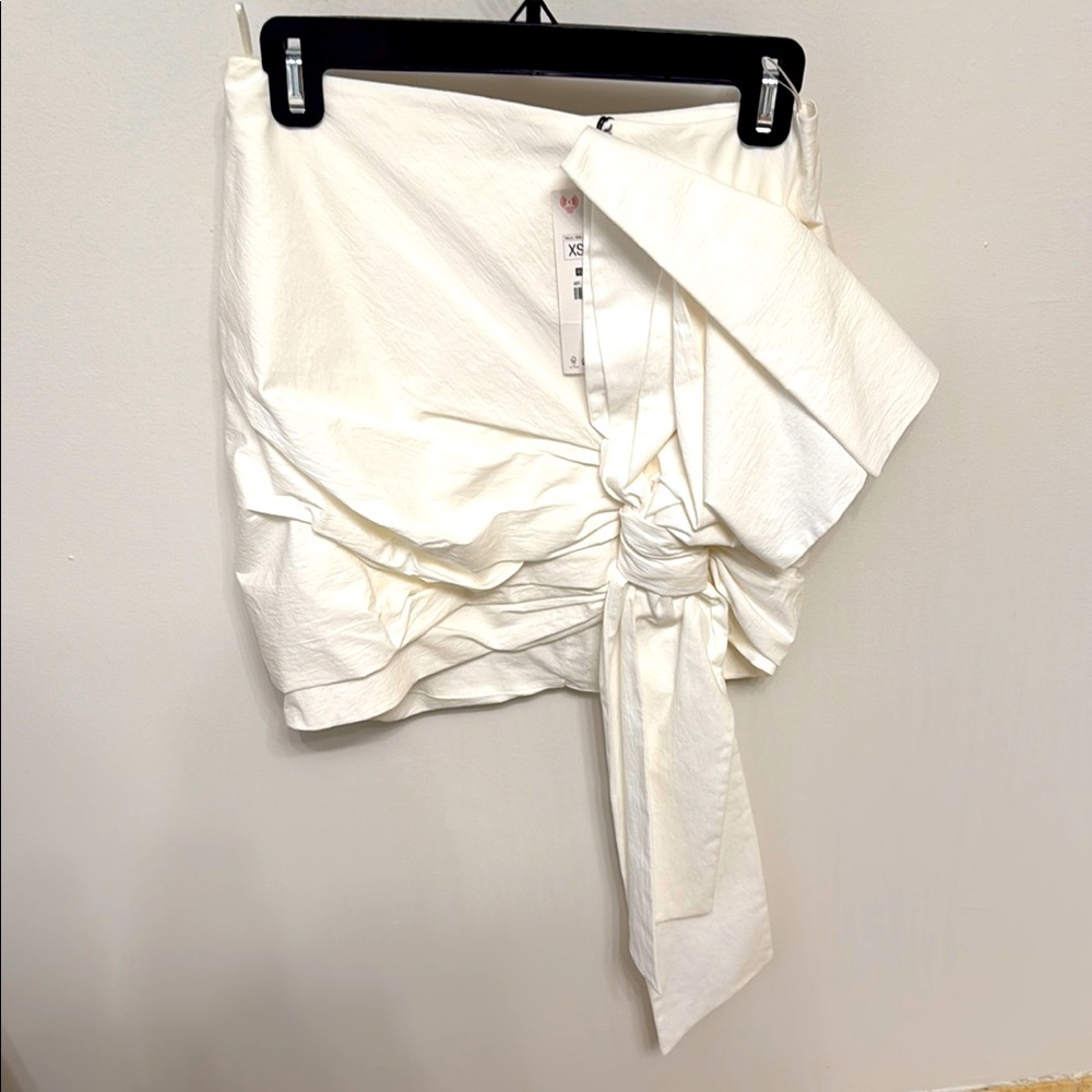 Zara- mini skirt with side detail in self fabric, size XS, dress up or down NWT